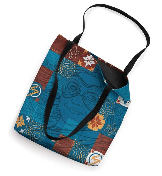 Ms. Marvel tote / shop it <a href=https://www.amazon.com/Marvel-Kamala-Khan-Patchwork-Quilt/dp/B09YVWVM86?ref_=ast_sto_dp&th=1&psc=1>here</a>