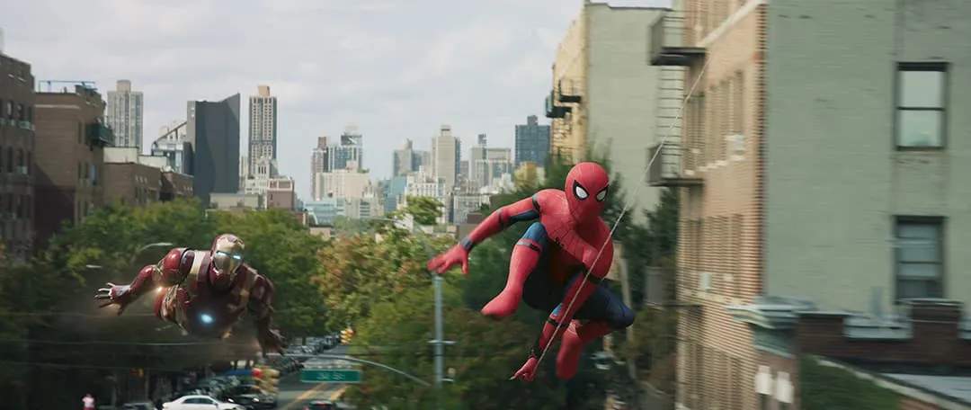 Spider-Man and Iron Man flying through the sky