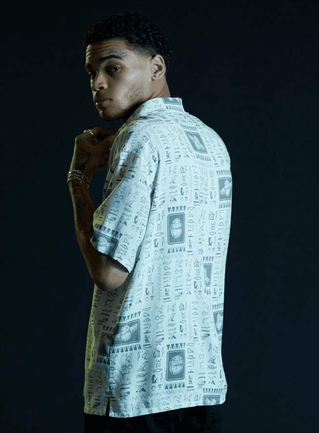 Moon Knight Scarab button up / shop it <a href=https://www.hottopic.com/product/our-universe-marvel-moon-knight-scarab-woven-button-up/17194866.html>here</a>