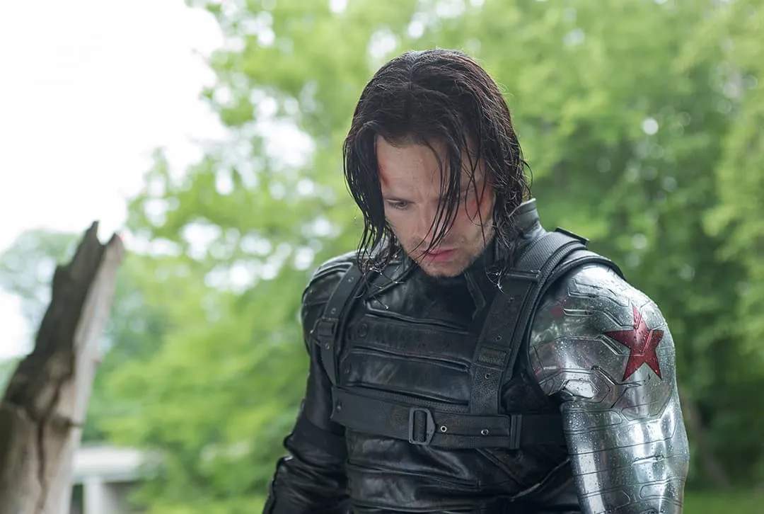 Winter Soldier (Bucky Barnes) saving a drowning Captain America (Steve Rogers)