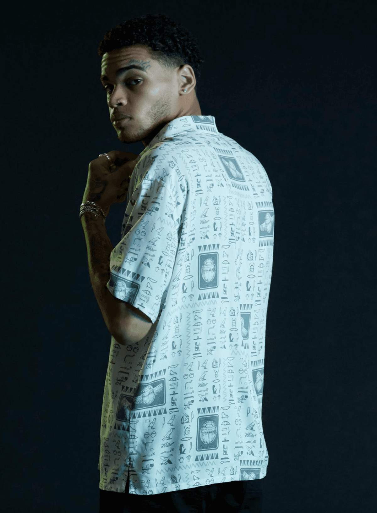 Moon Knight Scarab button up / shop it <a href=https://www.hottopic.com/product/our-universe-marvel-moon-knight-scarab-woven-button-up/17194866.html>here</a>